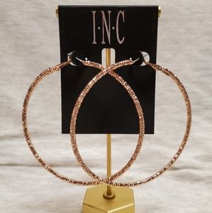 Rose gold toned large hoop earrings by INC